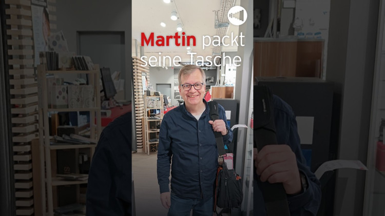 Martin packt seinen Koffer für unsere neue Filiale! Aber wo geht's hin?